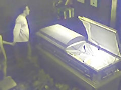 This funeral home employee gets caught fucking his gf on cam